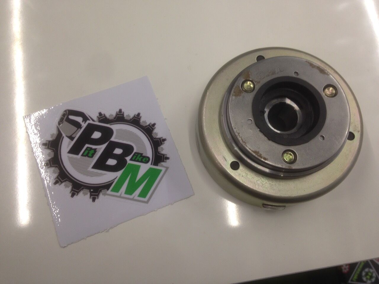 Ротор генератора с обгонной муфтой KAYO двиг. YX140 см3 (эл.стартер) CN